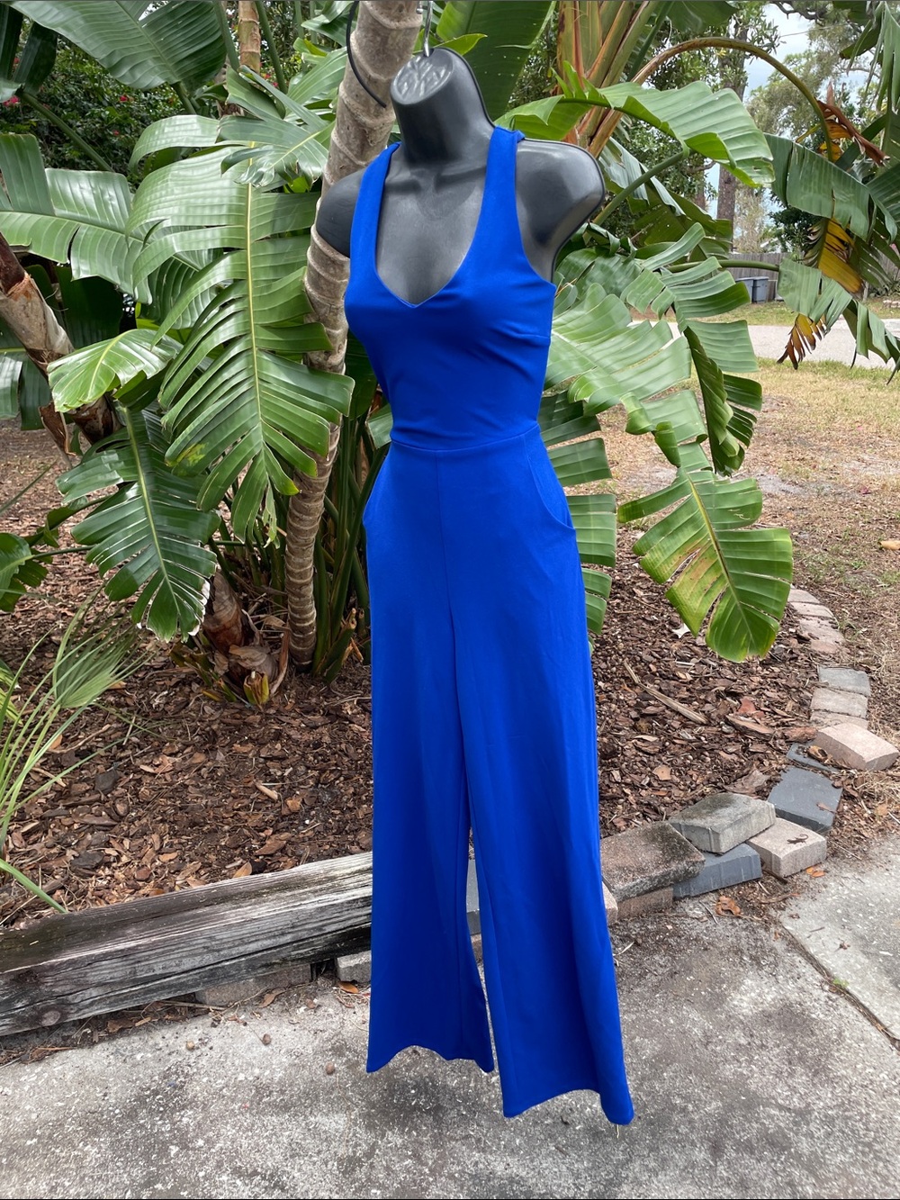 Crystal sky, deep blue necklace, or cross back wide leg jumpsuit